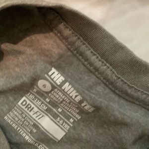 Bundle of boys under Armour and nike shirts